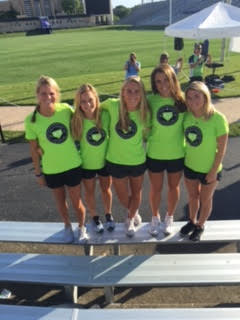 Ladies from the University of Michigan Lacrosse team volunteers to assist with the 2016 Cycle for a Cure Ride!
